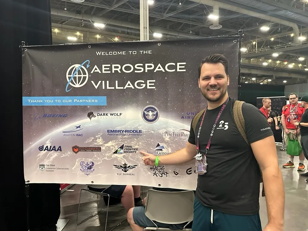 Aerospace Village partner banner at a security conference showing industry collaborators